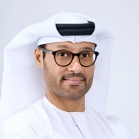 H.E. Dr. Mohamed Al Kuwaiti